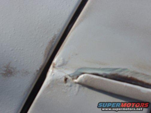 Note the bubbling paint, tells me there's rust underneath and needs investigating. 