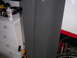 1994 Ford Bronco - A gray car door is shown leaning against a dresser, with a can of spray primer on the dresser.