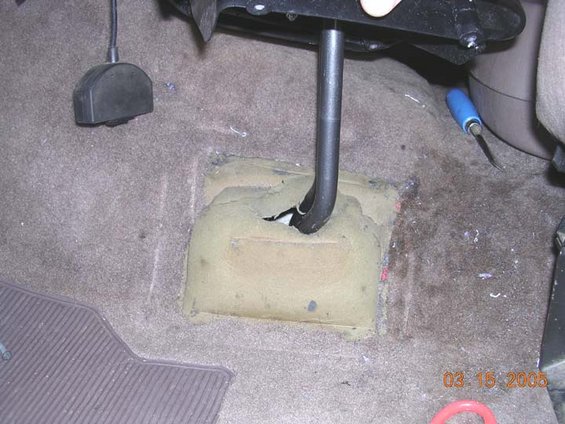 stickpadding.jpg went to pick and pull, and got this bracket and padding out of an F250.  im guessing that a bronco will have it too.  The f250 was late 80's, and was contoured correctly for my 94