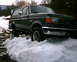 1988 Ford Bronco - This 1988 Ford Bronco navigates through a snowy landscape, its robust build.