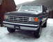 1988 Ford Bronco - Ford Bronco in snowy conditions, front view. Appears to be from the late 1980s.