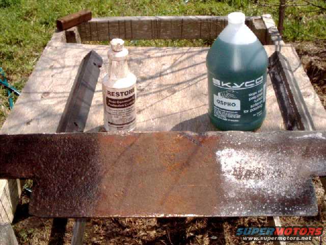 restore6.jpg comapring "Restore" to "Ospho" on rusty plate of metal, 24 hr's after applic.