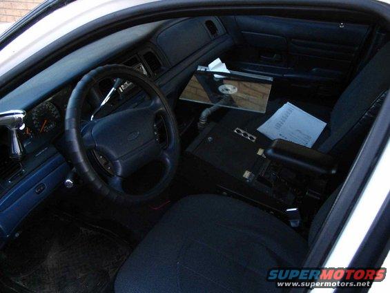 Inside my old car... I had a PA300 with siren functions disabled, a laptop stand that I made, 2 12" subs witha 300RMS amp. A JVC mp3/cd player and Pyramid 6x9s and 6x7s. Pretty nice setup for $300.