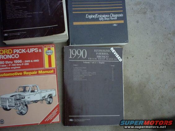 Several Ford repair manuals, including one for 1990 Econoline, F-Series, and Bronco trucks