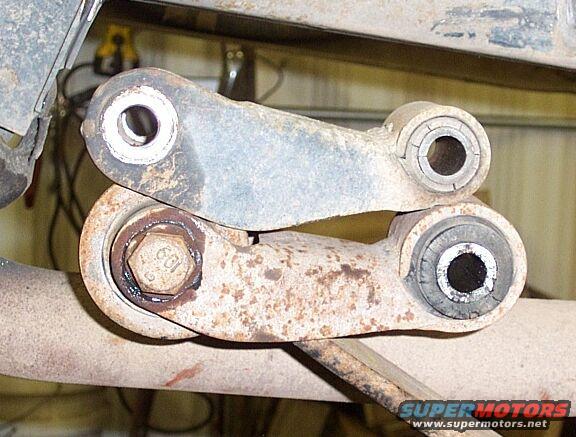 Rear shackles; on top, stock Ranger shackle, below is GM shackle that came with my 63" rear springs.  I used the GM shackle because of the larger bushing and.....