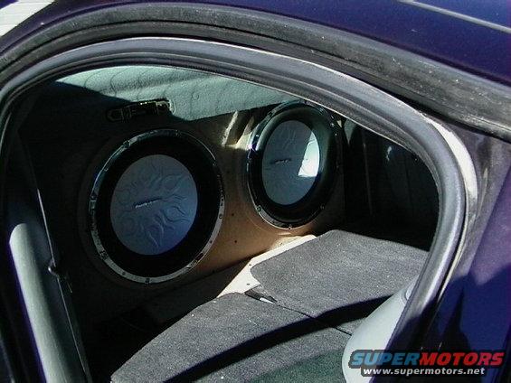 Dual subwoofers installed in a car's trunk