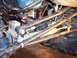 1974 Ford Bronco - Undercarriage view shows complex steering and suspension system components.