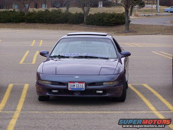 Purple 1993 Ford Probe parked in a lot, front view