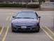 1993 Ford Probe - Front view of a purple 1993 Ford Probe in a parking lot.
