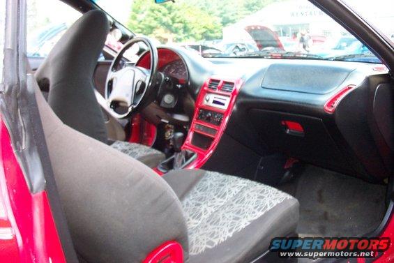 1993 Ford Probe interior with red trim accents and patterned seats