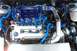 1993 Ford Probe - Close-up view of a modified engine bay a V6 turbo setup with vibrant blue hoses and piping.