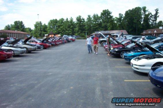 White 1993 Ford Probe parked in a lot with hoods up