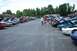 1993 Ford Probe - A row of 1993 Ford Probes are displayed with their hoods open at an outdoor car show.