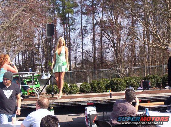 Woman in green dress on outdoor stage