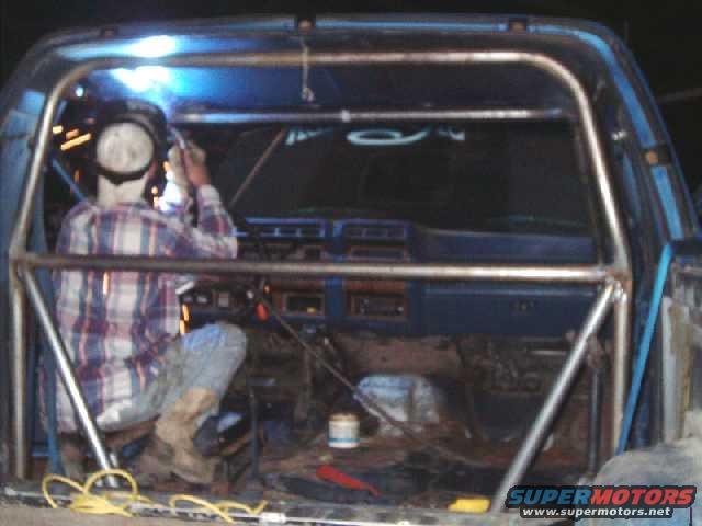 cagekit50.jpg Welding front post runner to roof hoop