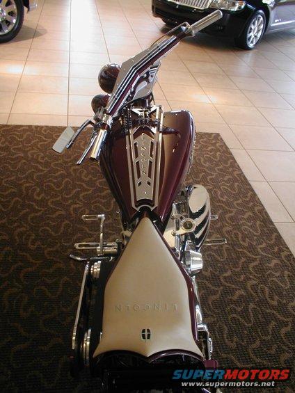 Custom motorcycle with Lincoln badging on the seat and tank, viewed from above