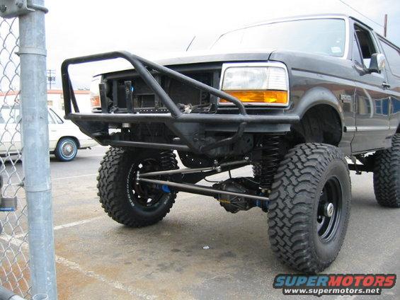 1992 Ford Bronco with custom front bumper and lift kit, front view