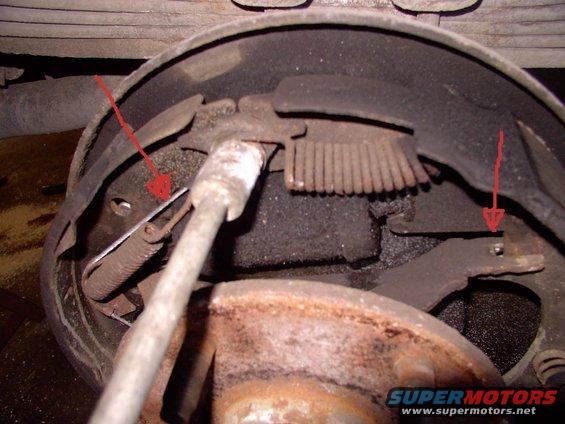 brake2.jpg The arrow on the right indicates the missing anti rattle spring which doesn't come with combi kits BTW. It's a stealership only item. Without it things come loose and you're back doing this all over again real soon, like me.