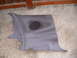 1993 Ford Probe - Gray interior door panel with integrated speaker grille, likely from a car's door.