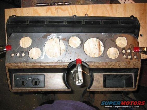 img_2323.jpg New guage panel cut, and drilled test fitting on original panel.
Holds
2 - 3-3/8 gauges
5 - 2-1/16 guages
7 - 1/2" switches (on-off)
1 - 1/2" Light
1 - 1/2" on-off-on momentary switch