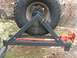 1988 Ford Bronco - Drilled through the tire carrier and installed two 1/2"x4" carriage bolts and secured them with large washers,lock washers and nuts.