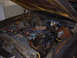 1972 Ford Ranchero - Engine bay of a 1972 Ford Ranchero shows a V8 engine with visible wiring and cooling components.