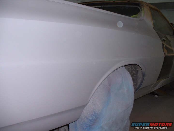 1972 Ford Ranchero side view, body in primer, wheel well covered with blue cloth