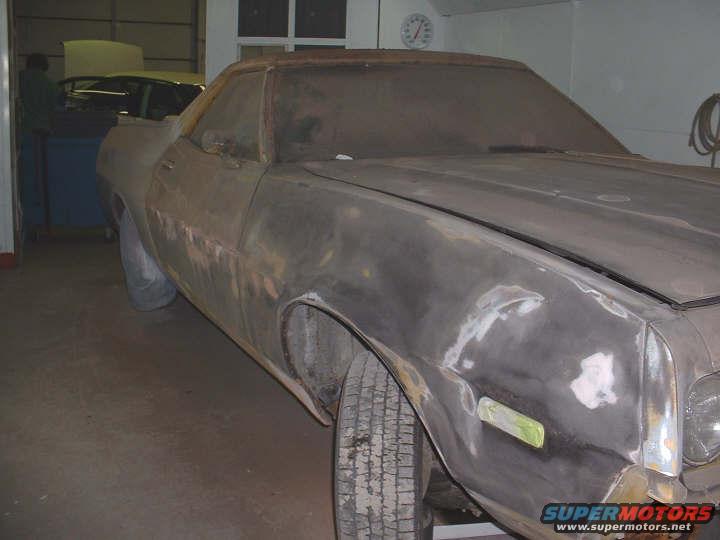 1972 Ford Ranchero bodywork in a garage, another car visible behind