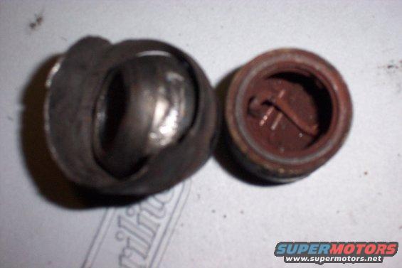 u-joint and its cap, both appear worn and rusty
