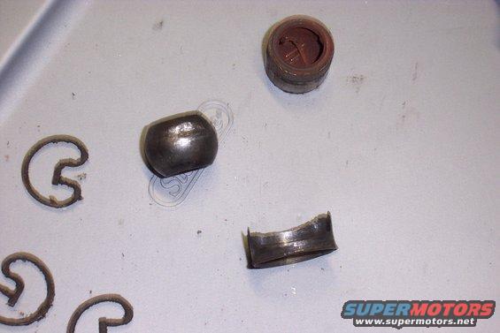 U-joint bearing cap, roller bearings, and grease pot