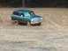 1978 Ford Bronco - This 1978 Ford Bronco is navigating a challenging muddy terrain.