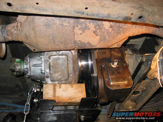Vehicle drivetrain components supported by wood blocks and chains
