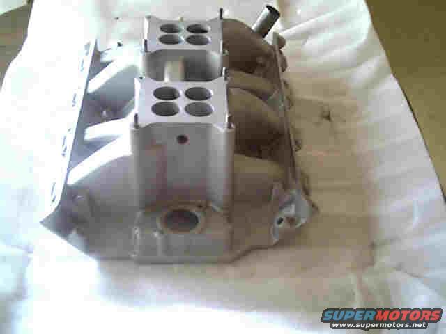 Engine intake manifold with four carburetor mounting holes