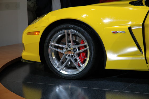 Yellow sports car with red brake calipers and a Z06 badge on the fender
