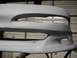1994 Ford Probe - A car bumper is shown, ready for paint. The "SUPERMOTORS.NET" watermark is visible at the bottom right.