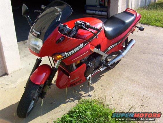 Red Kawasaki Ninja EX500 motorcycle, 3q-front view