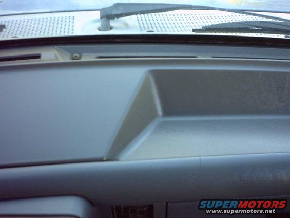 Dashboard of a 1990 Ford Bronco, showing the passenger side dash panel and air vents