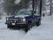 1979 Chevrolet C/K Pickup - 1979 Chevrolet C/K Pickup navigating a snowy landscape with 'DREAM ON' visible on the windshield.