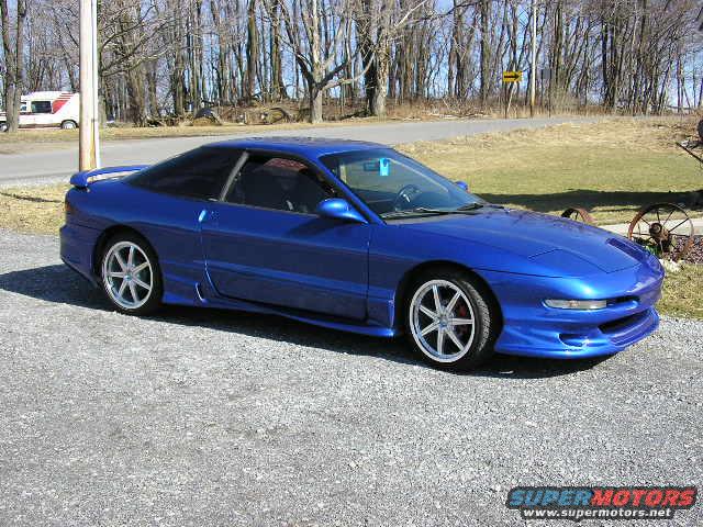 Blue 1994 Ford Probe coupe, 3q front view