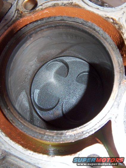 piston sidewalls are still shiny, miles are unknown on this motor