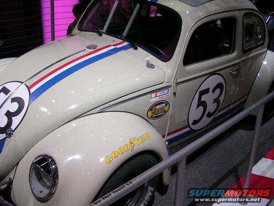 White Volkswagen Beetle with racing stripes and number 53