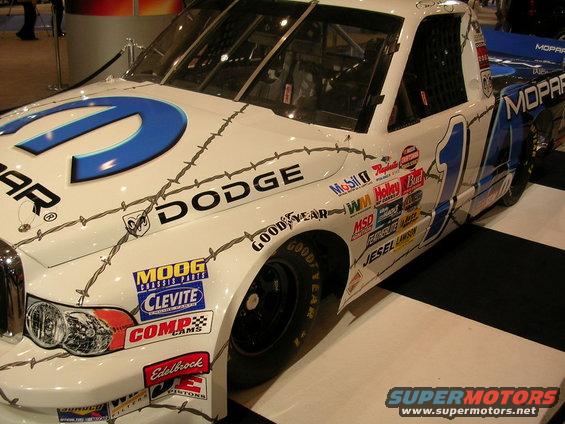 Dodge race truck with Mopar logo and sponsor decals