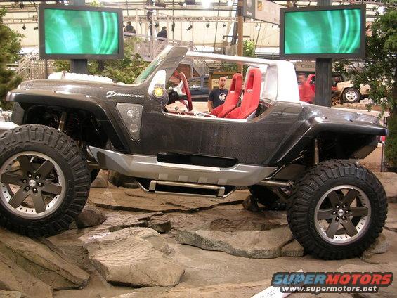 Concept off-road vehicle with exposed suspension and red seats