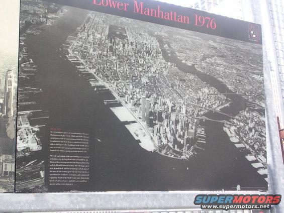 Aerial photograph of Lower Manhattan from 1976, with text describing its development