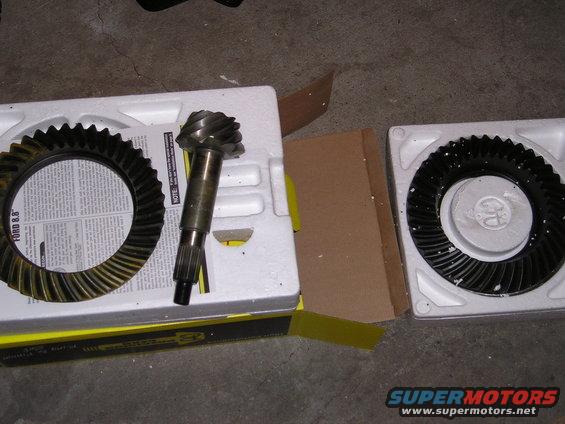 Differential gears in packaging, one ring gear shows "FORD 8.8" text