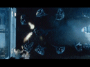 Dark, moody scene with multiple floating, translucent objects against a wall