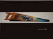 1978 Ford Mustang II - A 1978 Ford Mustang II is airbrushed onto a saw blade, depicting a beach scene.