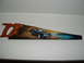 1978 Ford Mustang II - Airbrushed artwork of a classic coupe on a beach scene adorns a hand saw.