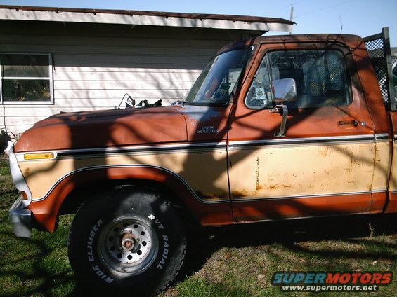 Rusty 1978 Ford F-150 side view with two-tone paint