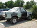 1988 Ford Bronco - This Ford Bronco is undergoing bodywork and is partially covered with plastic sheeting.